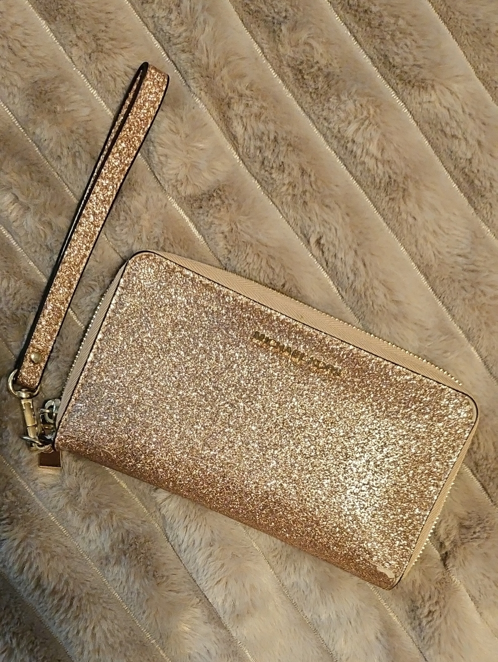Michael Kors Glitter Zip Wristlet in Rose Gold